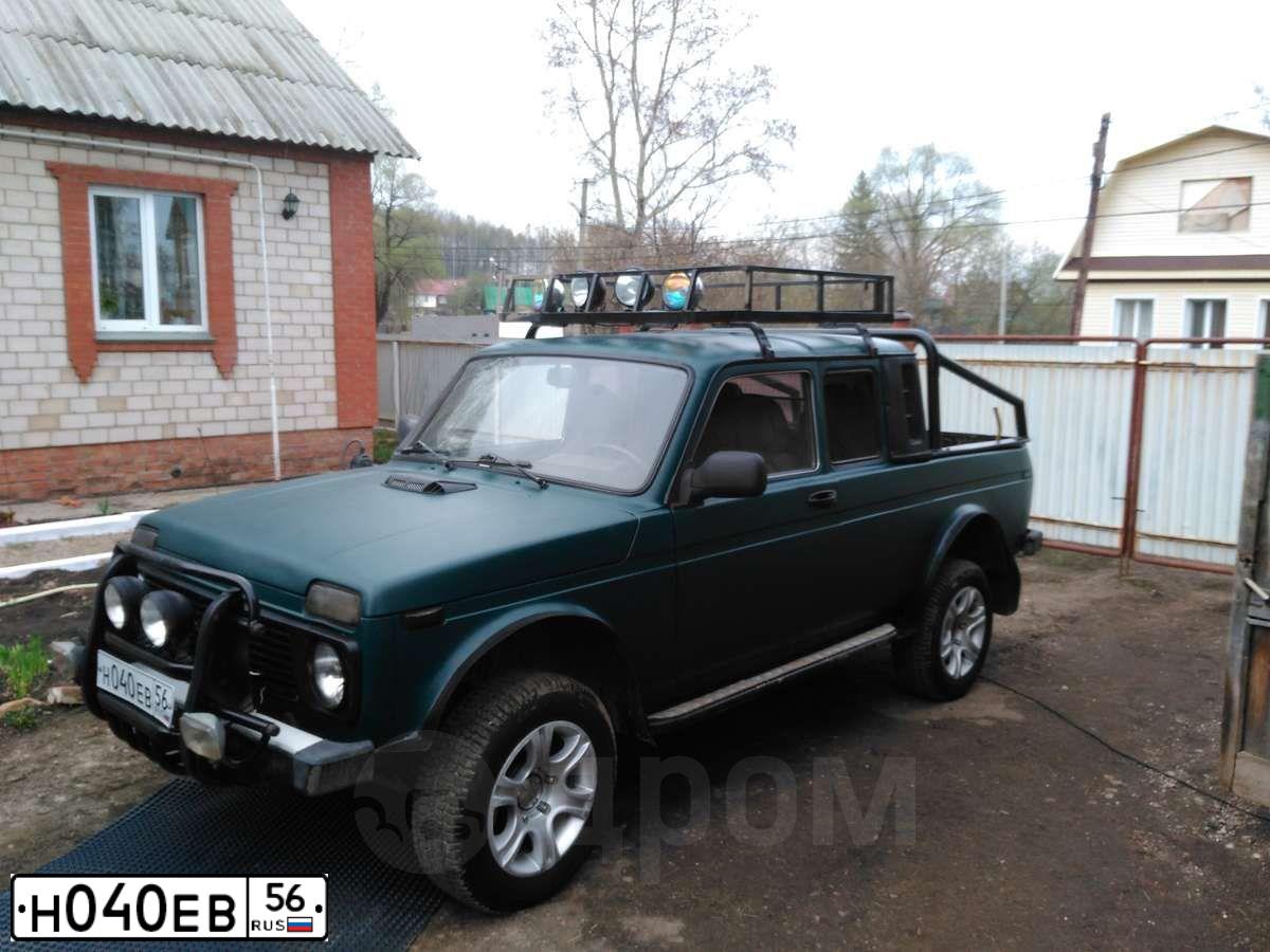 Фото автомобиля VAZ 2329 NIVA, 2001 — госномер Н040ЕВ56. Цвет: ЗЕЛЕНЫЙ