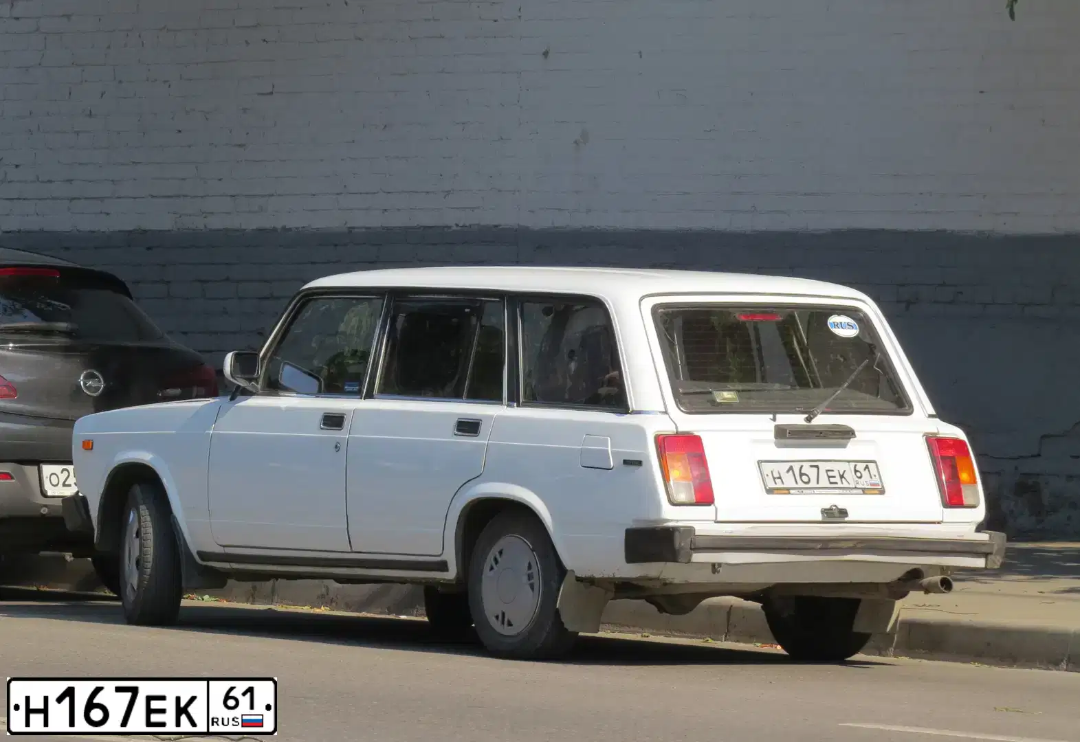 Фото автомобиля LADA 2104, 1999 — госномер Н167ЕК61. Цвет: БЕЛЫЙ