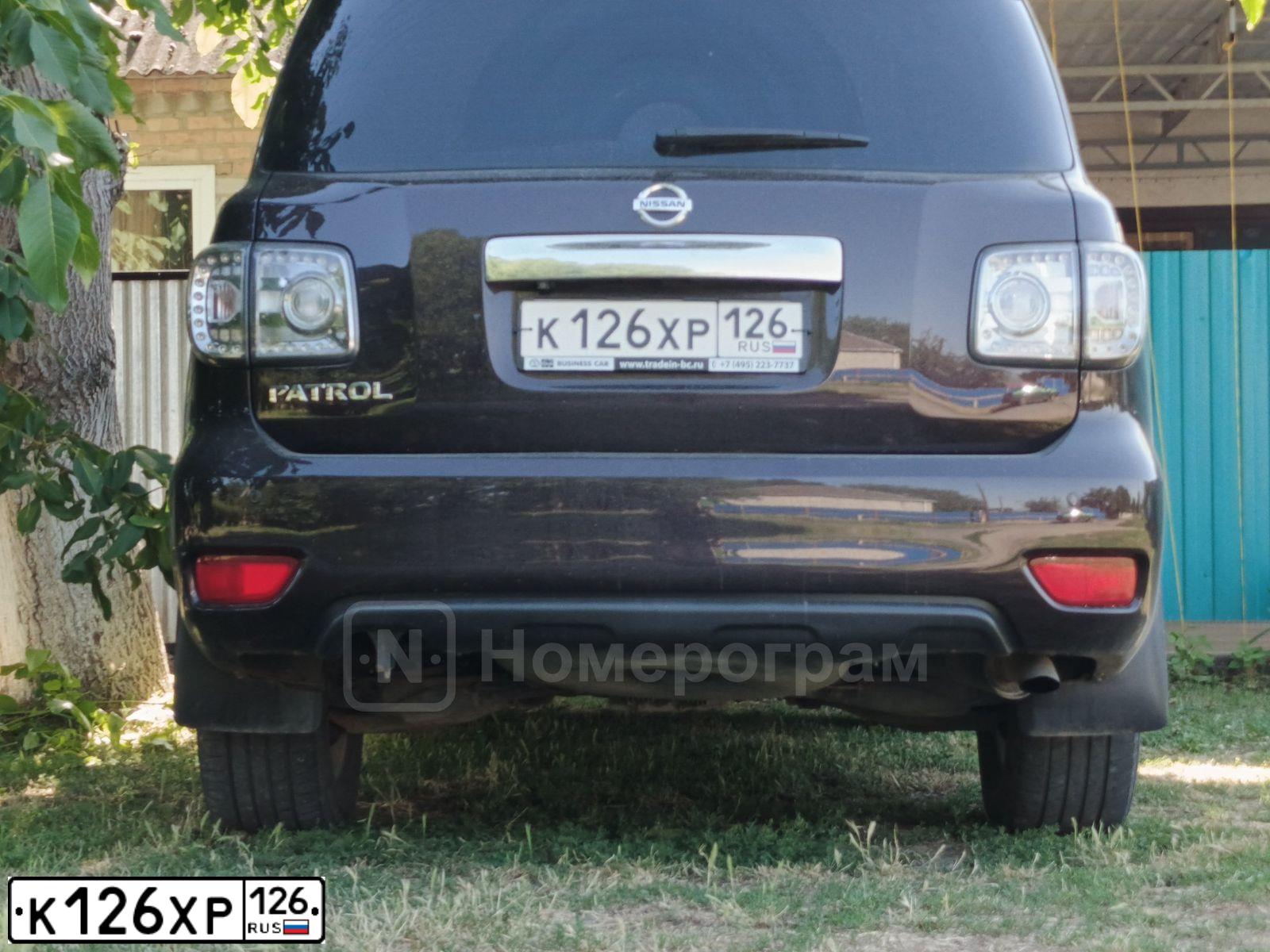 Фото автомобиля NISSAN PATHFINDER, 2003 — госномер Е404ЕР150. Цвет: ЧЕРНЫЙ