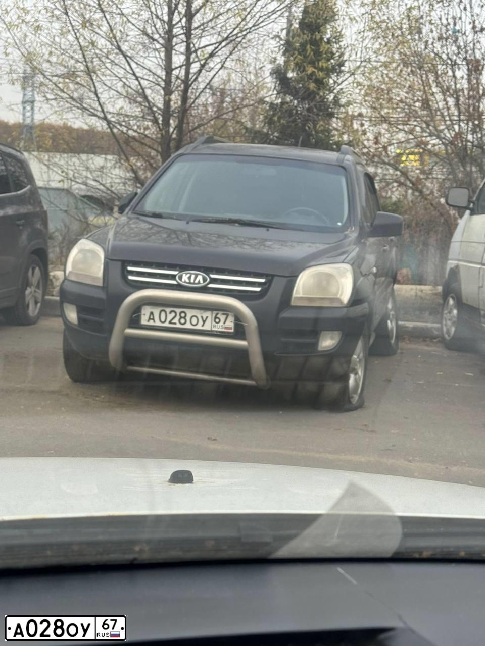 Фото автомобиля KIA SPORTAGE, 2006 — госномер А028ОУ67. Цвет: ЧЕРНЫЙ