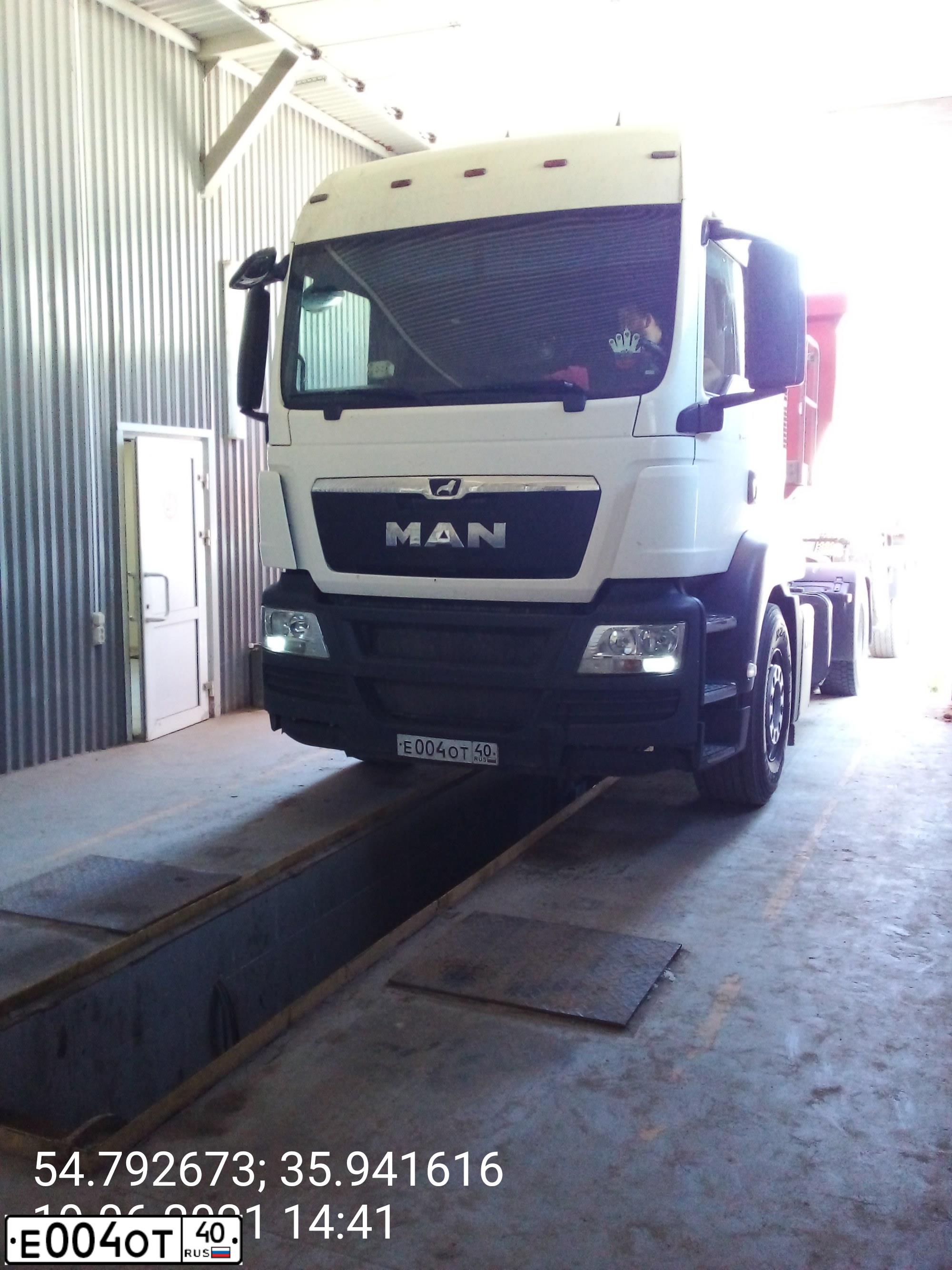 Фото автомобиля СКАНИЯ SCANIA Р8Х400, 2011 — госномер Т608РТ58. Цвет: Красный