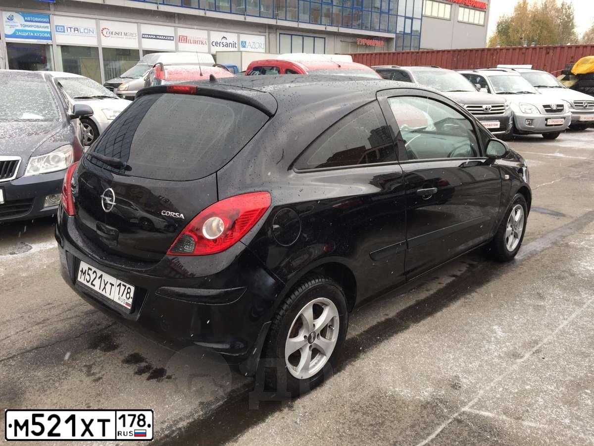 Фото автомобиля OPEL CORSA, 2007 — госномер М521ХТ178. Цвет: ЧЕРНЫЙ