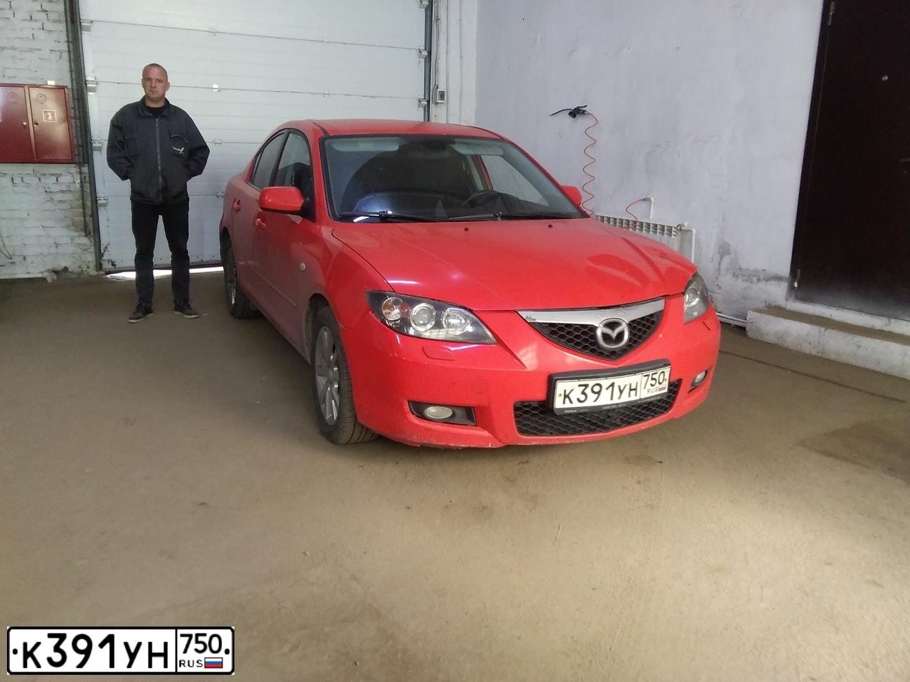 Фото автомобиля MAZDA 3, 2007 — госномер Р307КК977. Цвет: Красный