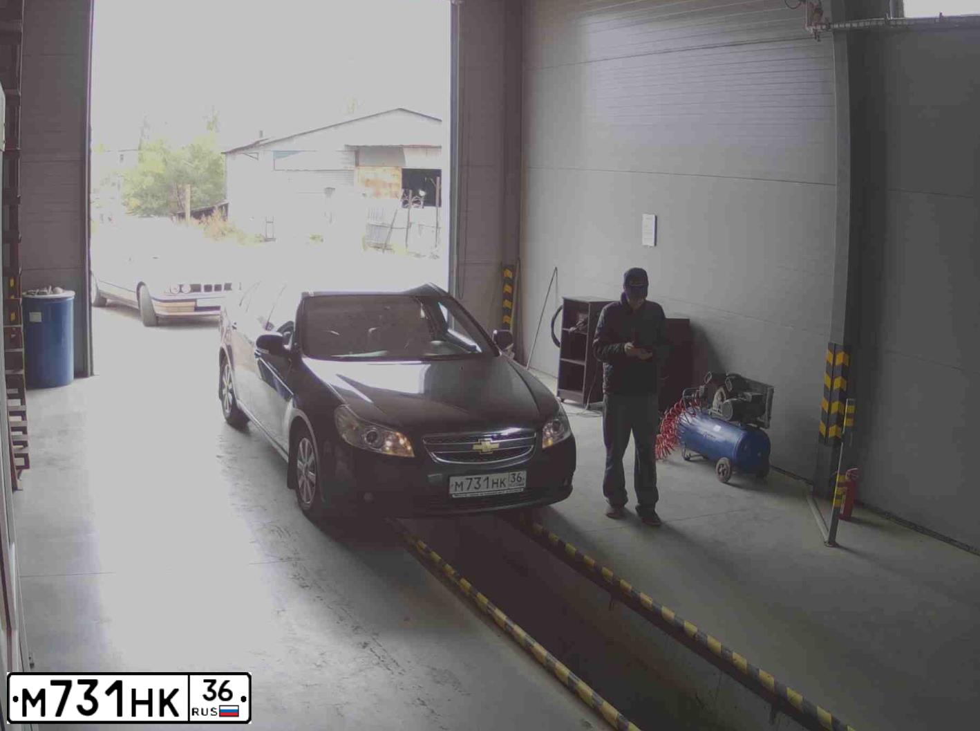 Фото автомобиля CHEVROLET EPICA, 2010 — госномер М731НК36. Цвет: ЧЕРНЫЙ