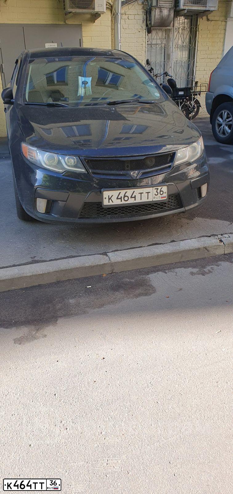 Фото автомобиля KIA CERATO, 2011 — госномер К464ТТ36. Цвет: ЧЕРНЫЙ