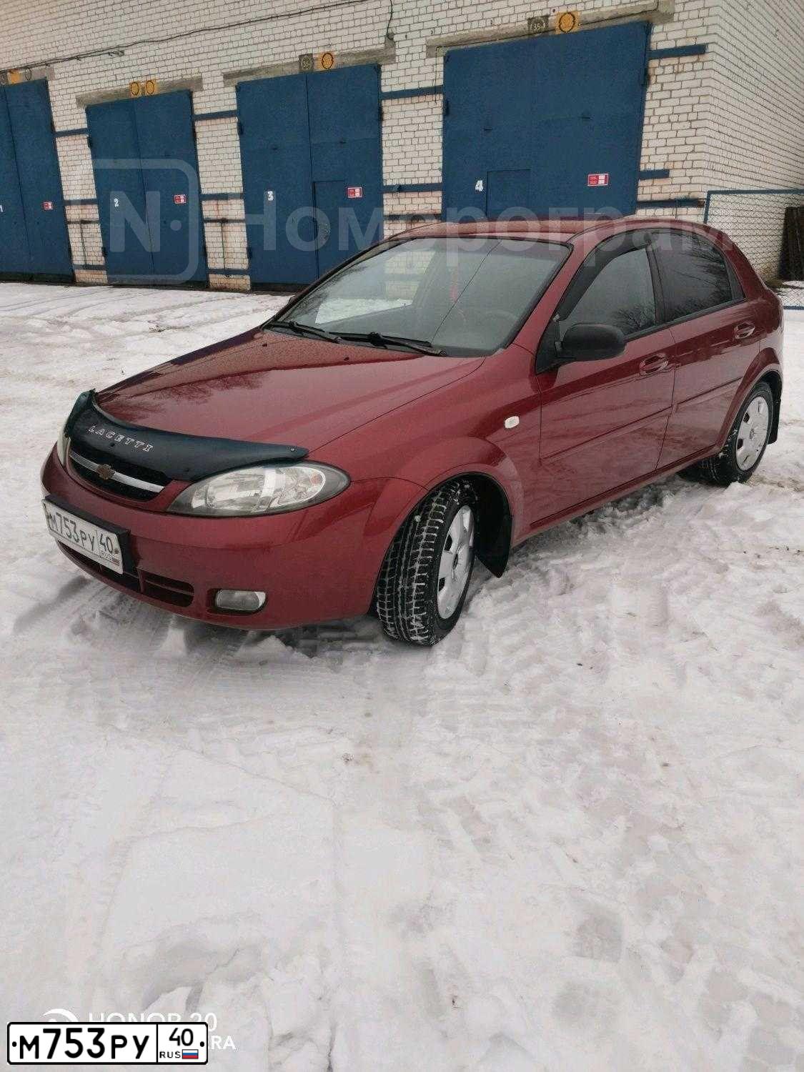 Фото автомобиля CHEVROLET LACETTI, 2006 — госномер М753РУ40. Цвет: Красный