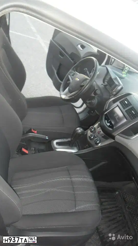 Фото автомобиля CHEVROLET AVEO, 2014 — госномер Н937ТА161. Цвет: БЕЛЫЙ
