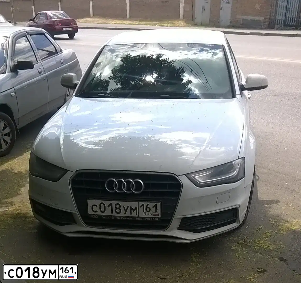 Фото автомобиля AUDI A4, 2015 — госномер С018УМ161. Цвет: Белый