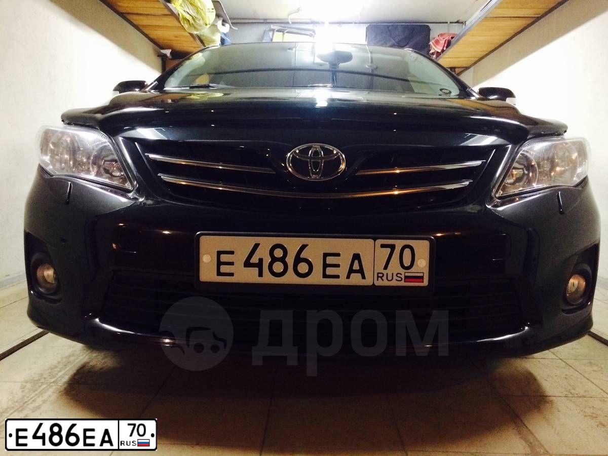 Фото автомобиля TOYOTA COROLLA, 2012 — госномер Е486ЕА70. Цвет: ЧЕРНЫЙ