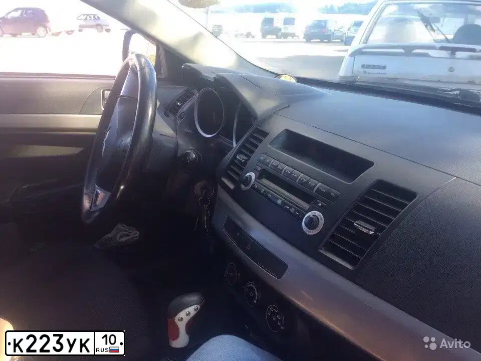 Фото автомобиля MITSUBISHI LANCER, 2007 — госномер К223УК10. Цвет: синий