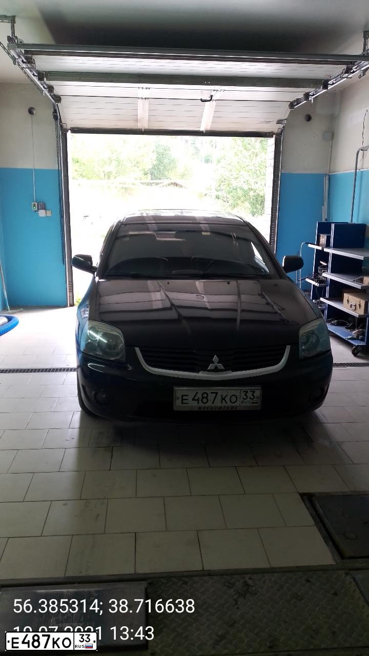 Фото автомобиля MITSUBISHI GALANT, 2006 — госномер Е487КО33. Цвет: БЕЖЕВЫЙ
