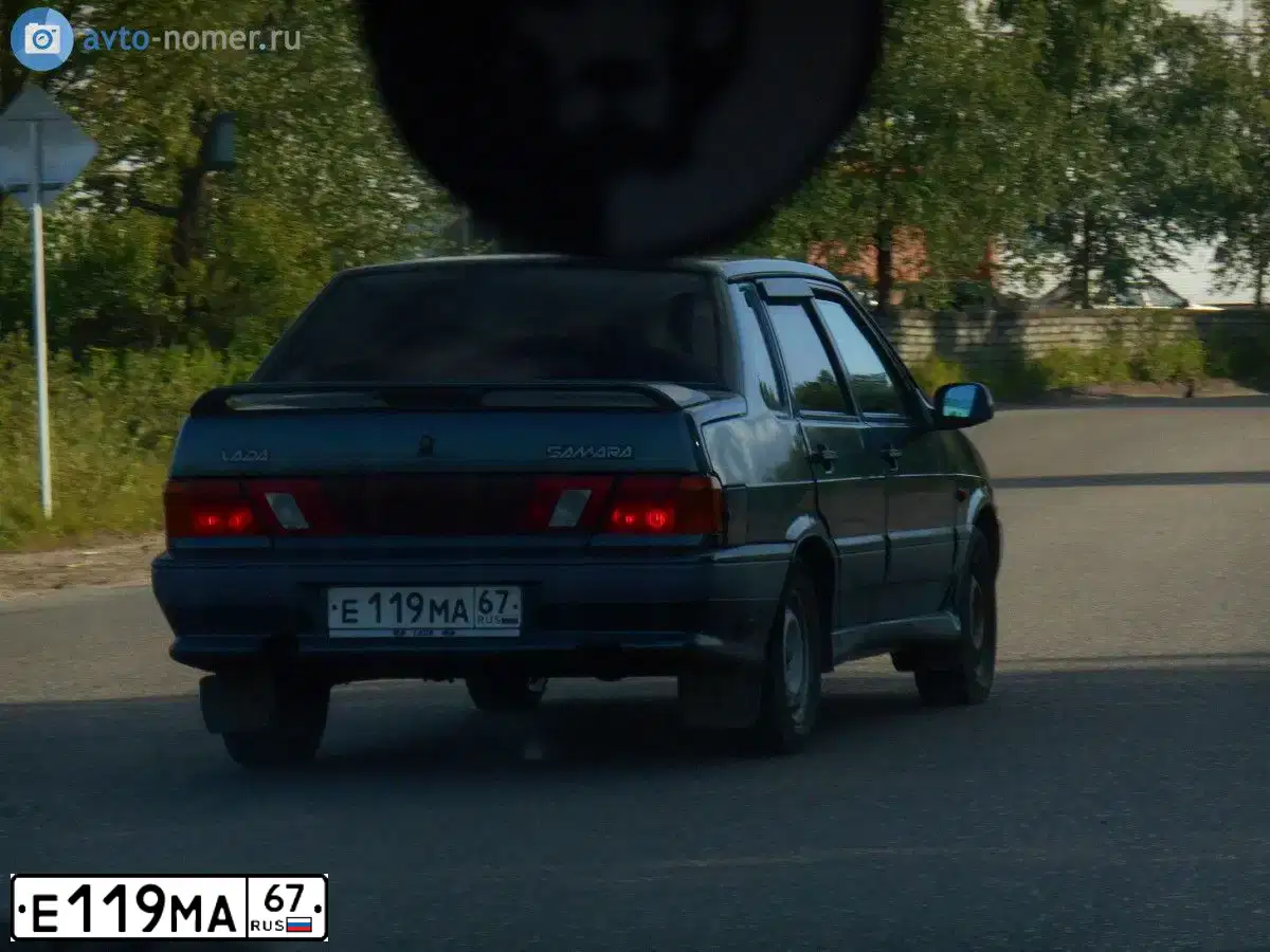 Фото автомобиля LADA 2115 SAMARA, 2006 — госномер Е119МА67. Цвет: СИНЕ-ЗЕЛЕНЫЙ