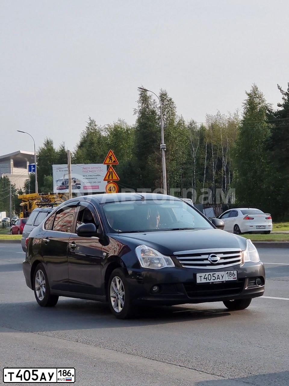 Фото автомобиля NISSAN ALMERA /AVTOVAZ/, 2014 — госномер А181ХО172. Цвет: ЧЕРНЫЙ