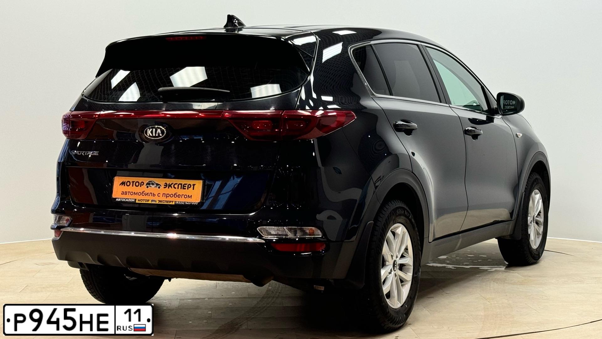Фото автомобиля KIA SPORTAGE, 2019 — госномер Р945НЕ11. Цвет: ЧЕРНЫЙ ПЕРЛАМУТР