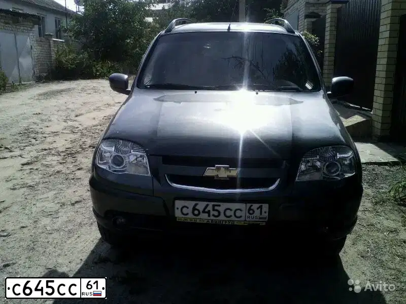 Фото автомобиля CHEVROLET LACETTI, 2012 — госномер Х116АВ761. Цвет: ЧЕРНЫЙ