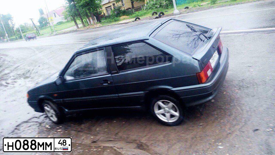 Фото автомобиля LADA 2113 SAMARA, 2012 — госномер Н088ММ48. Цвет: сине-зеленый