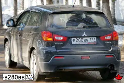Фото автомобиля МИЦУБИСИ ASX 1.6, 2012 — госномер Е213ЕВ977. Цвет: ЧЕРНЫЙ