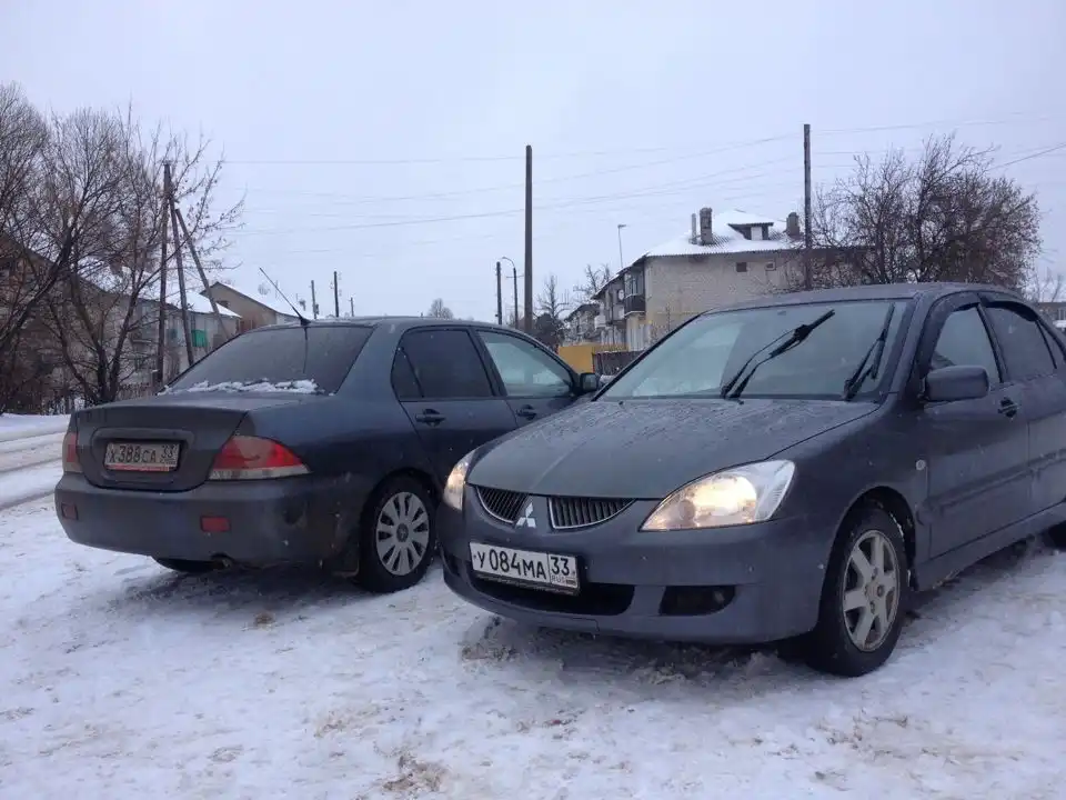Фото автомобиля MITSUBISHI LANCER, 2005 — госномер А348ММ799. Цвет: СЕРЫЙ