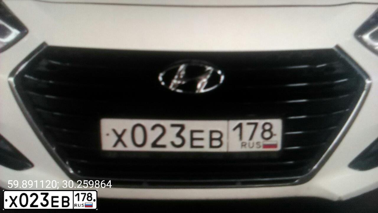 Фото автомобиля HYUNDAI I40, 2017 — госномер Х023ЕВ178. Цвет: БЕЛЫЙ