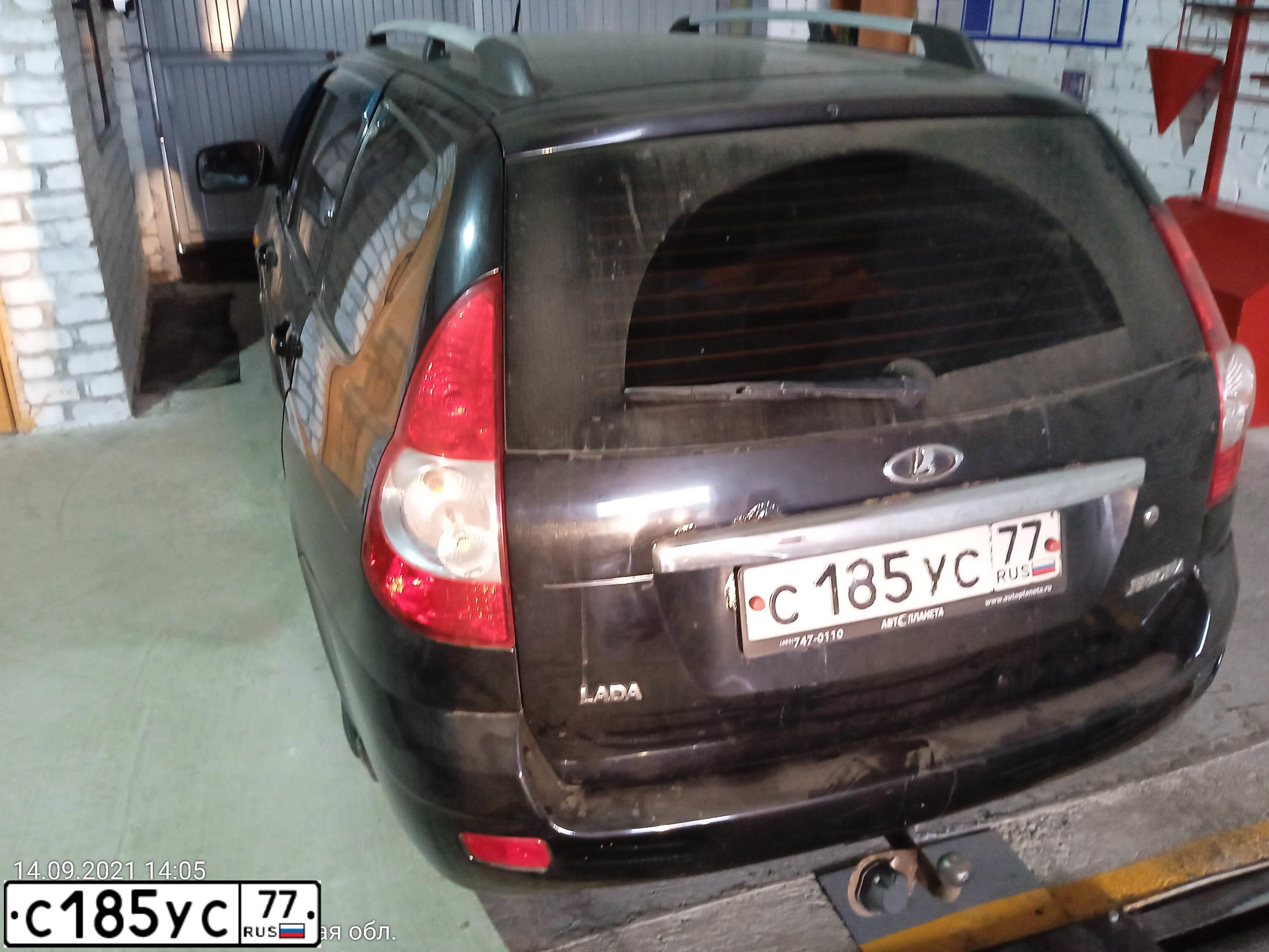 Фото автомобиля LADA 2171 PRIORA, 2012 — госномер С185УС77. Цвет: ЧЕРНЫЙ