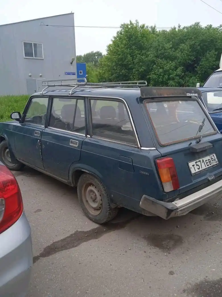 Фото автомобиля LADA 2104 LADA, 1997 — госномер Т571ЕВ62. Цвет: МУРЕНА