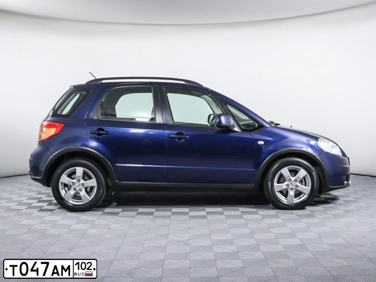 Фото автомобиля SUZUKI SX 4, 2010 — госномер Т047АМ102. Цвет: синий