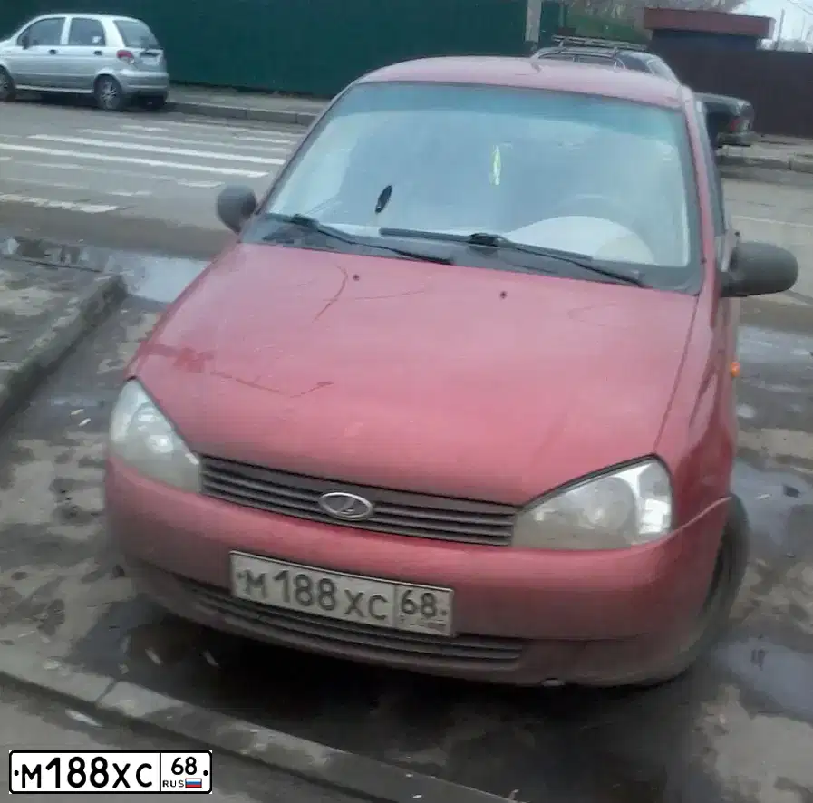 Фото автомобиля LADA 1118 KALINA, 2007 — госномер М188ХС68. Цвет: СЕРЕБРИСТО-КРАСНЫЙ