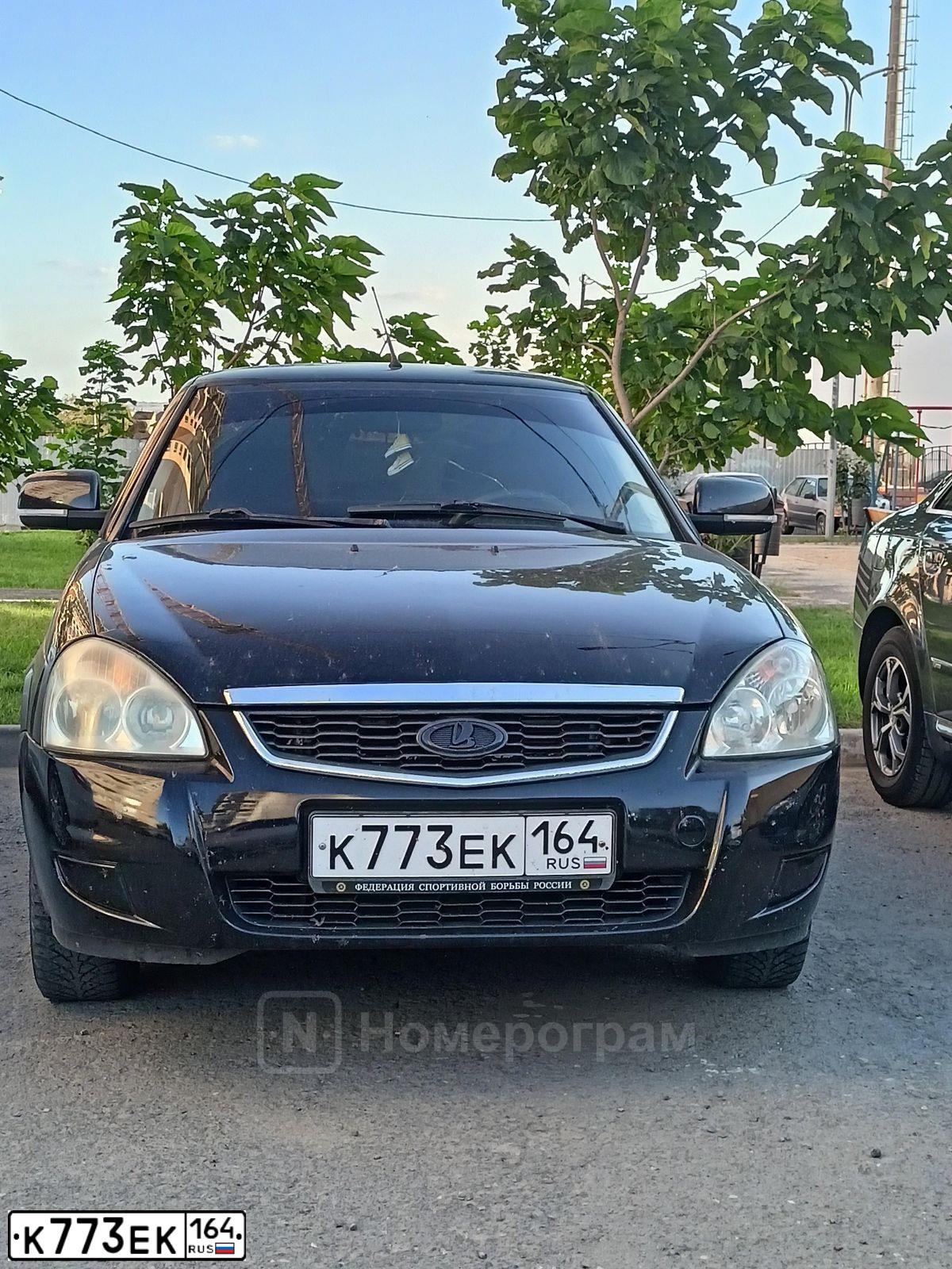 Фото автомобиля LADA PRIORA, 2010 — госномер В061ОЕ30. Цвет: СИНЕ-ЧЕРНЫЙ