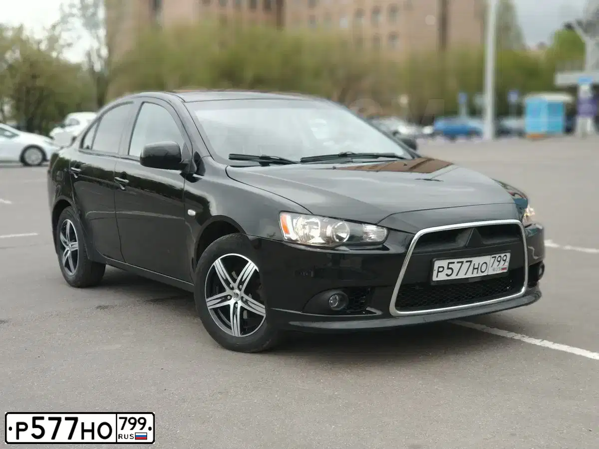 Фото автомобиля MITSUBISHI LANCER, 2008 — госномер О390ВК181. Цвет: ЧЕРНЫЙ