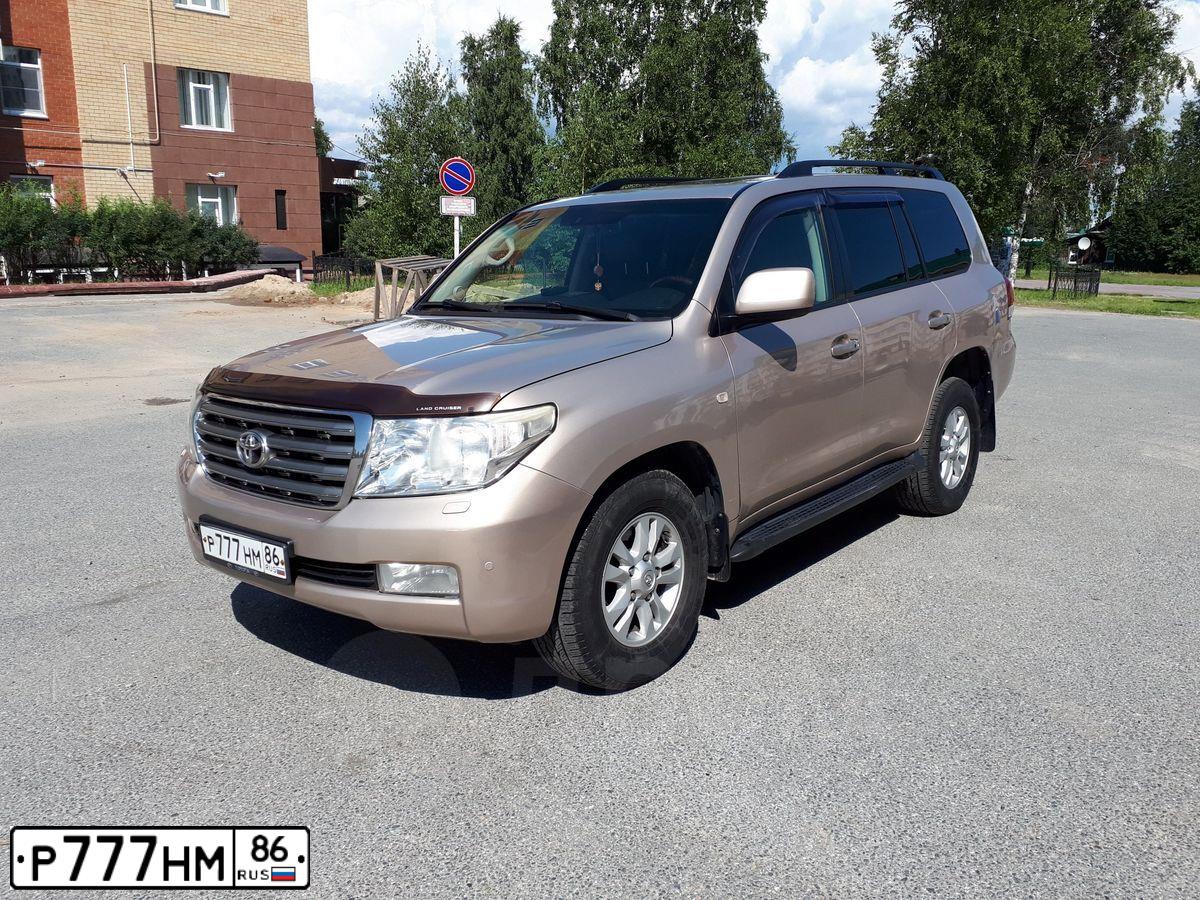Фото автомобиля TOYOTA LANDCRUISER 200, 2008 — госномер Р777НМ86. Цвет: ЗОЛОТИСТЫЙ