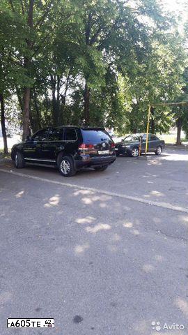 Фото автомобиля VOLKSWAGEN TOUAREG, 2009 — госномер О260ОО62. Цвет: ЧЕРНЫЙ