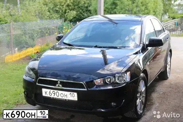 Фото автомобиля MITSUBISHI LANCER, 2007 — госномер К690ОН10. Цвет: ЧЕРНЫЙ