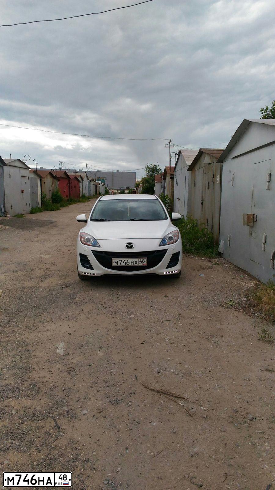 Фото автомобиля MAZDA 3, 2011 — госномер М746НА48. Цвет: БЕЛЫЙ
