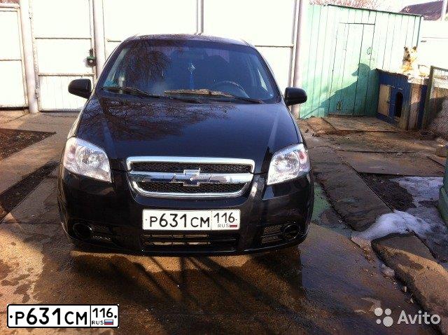 Фото автомобиля CHEVROLET AVEO, 2009 — госномер Е031КТ196. Цвет: ЧЕРНЫЙ