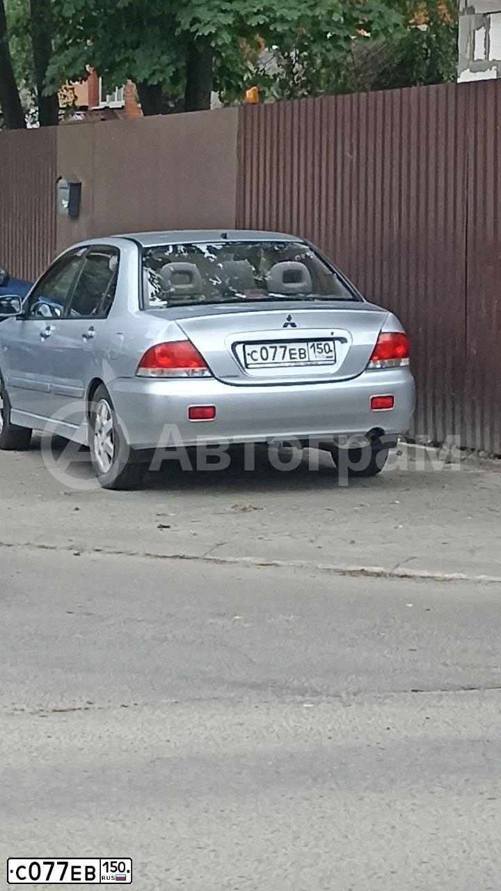 Фото автомобиля MITSUBISHI LANCER, 2005 — госномер А325ТУ790. Цвет: СЕРЕБРИСТЫЙ