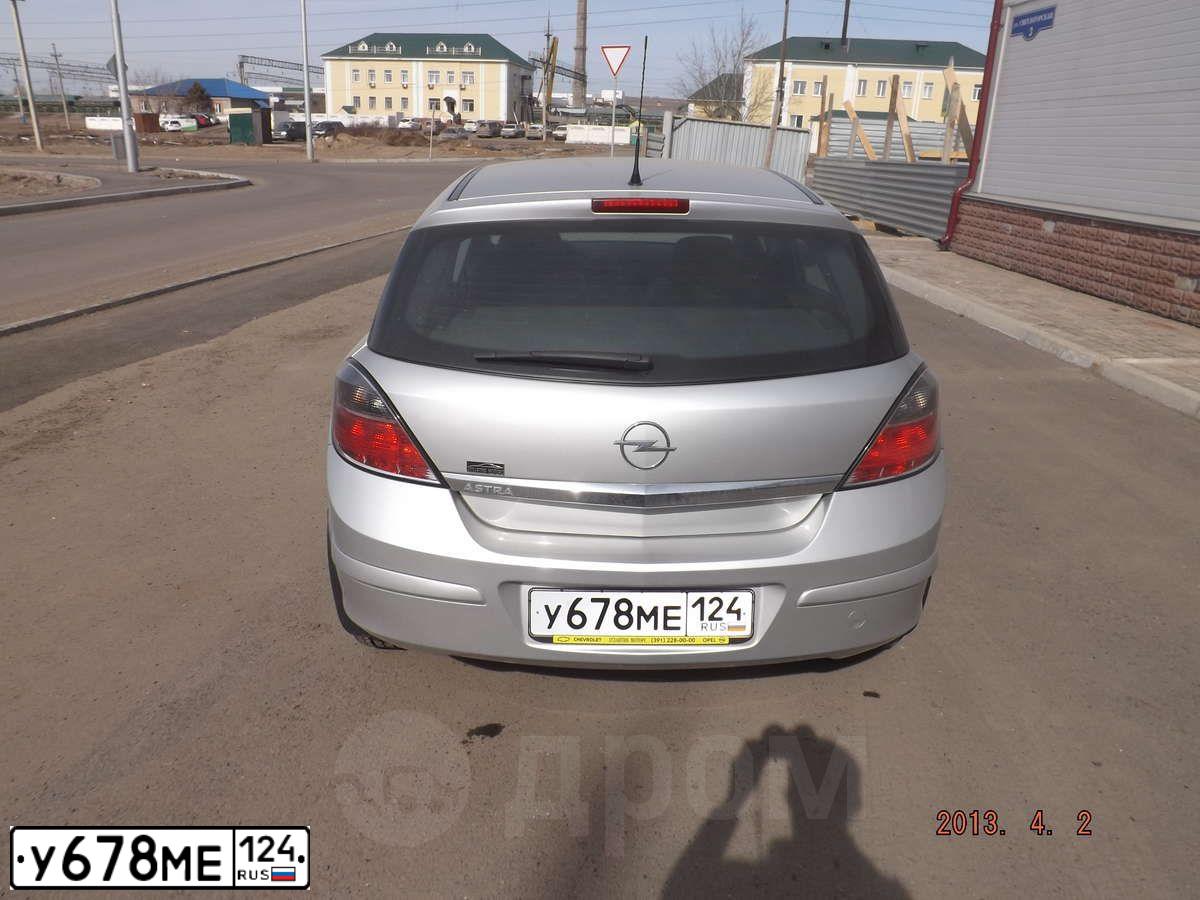 Фото автомобиля OPEL ASTRA, 2011 — госномер Е606УС124. Цвет: СЕРЕБРИСТЫЙ