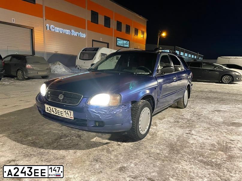 Фото автомобиля СУЗУКИ BALENO, 1999 — госномер О150КЕ75. Цвет: синий