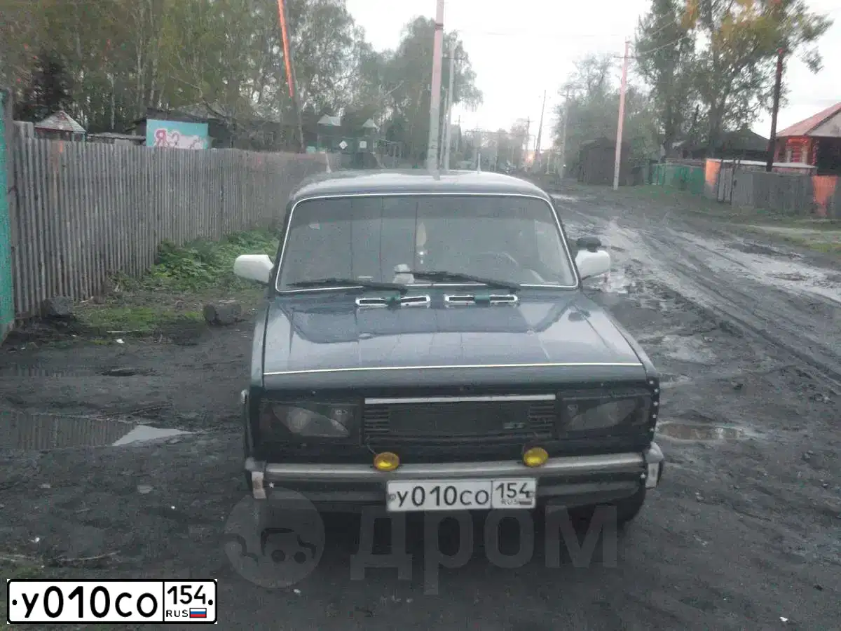 Фото автомобиля LADA 2105, 1986 — госномер У010СО154. Цвет: Т СИНИЙ