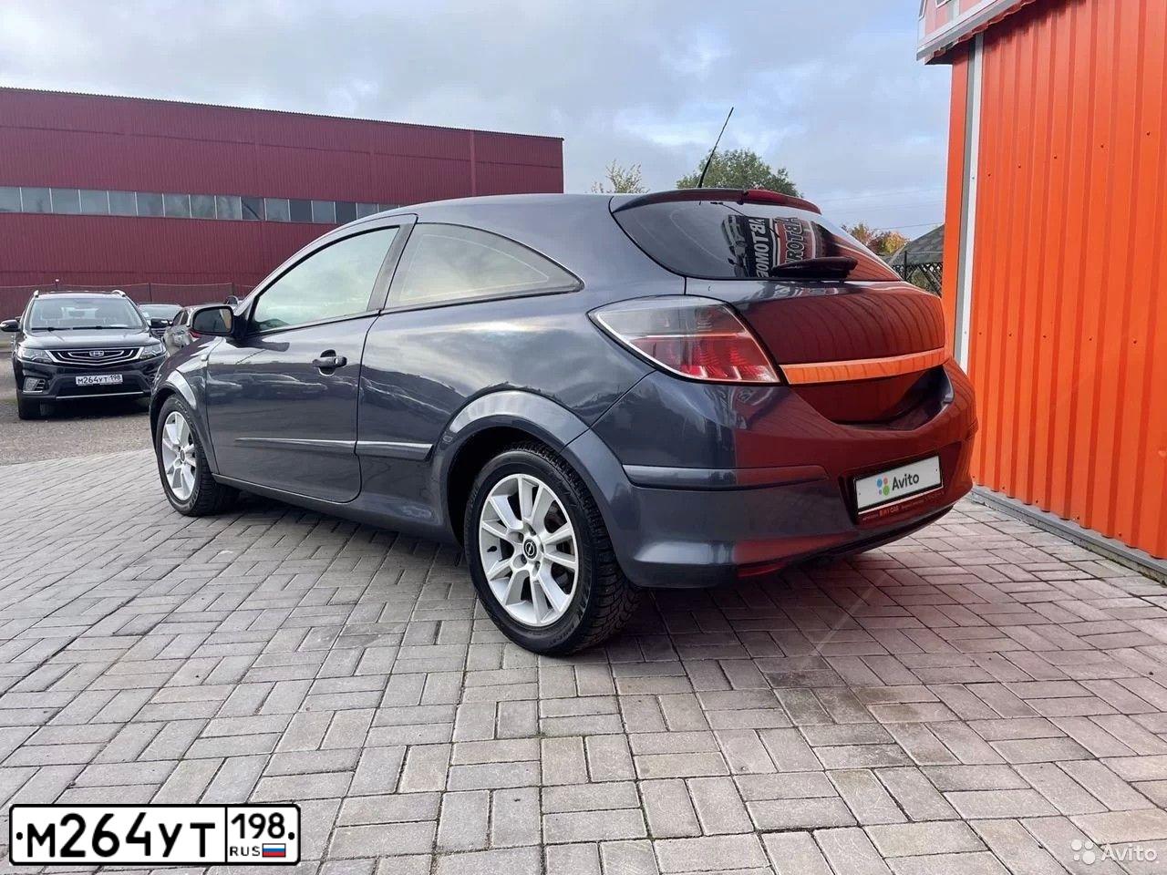 Фото автомобиля GEELY EMGRAND X7, 2019 — госномер К586СА53. Цвет: ЧЕРНЫЙ