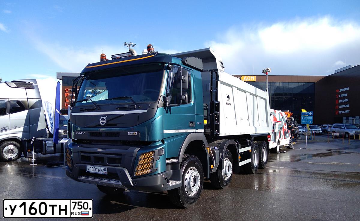 Фото автомобиля VOLVO SERIE FM /8X4/, 2019 — госномер О062АУ198. Цвет: синий