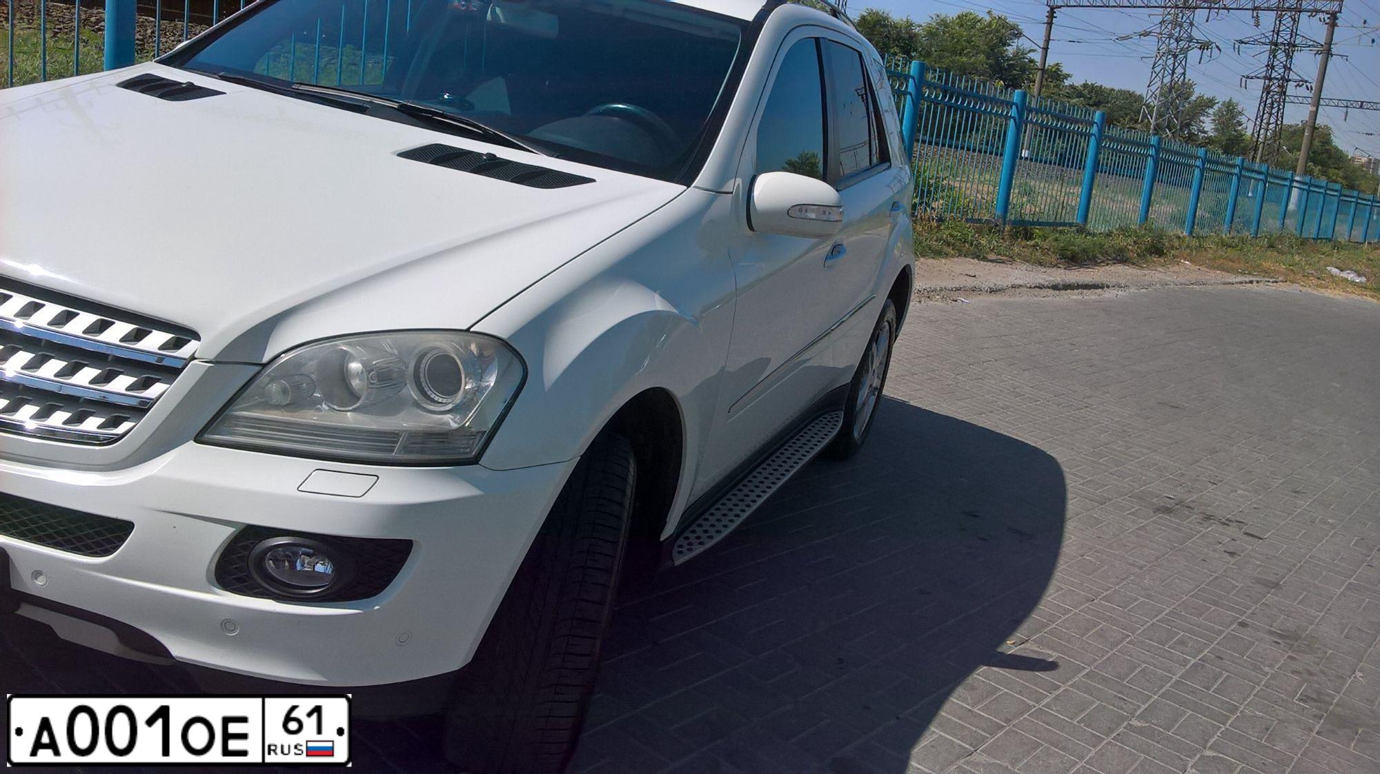 Фото автомобиля LADA 2105, 2003 — госномер А001ОЕ61. Цвет: ЧЕРНЫЙ