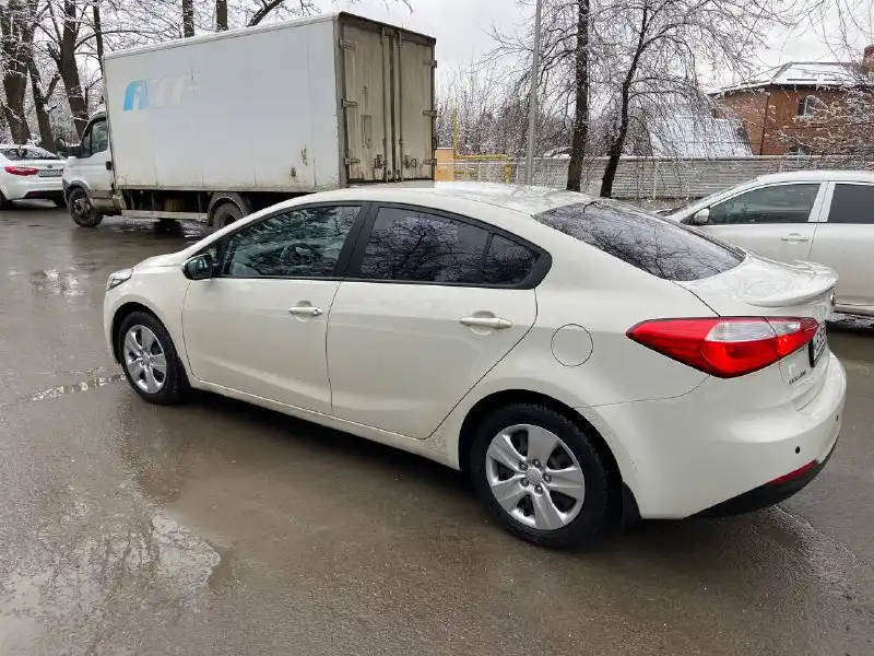 Фото автомобиля КИА YD (CERATO FORTE), 2013 — госномер Е550КС180. Цвет: СЕРЕБРИСТЫЙ