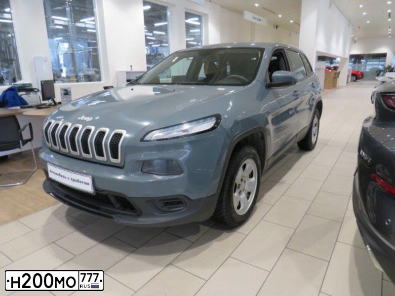 Фото автомобиля JEEP GRAND CHEROKEE, 2014 — госномер Н200МО777. Цвет: СЕРО-ЗЕЛЕНЫЙ