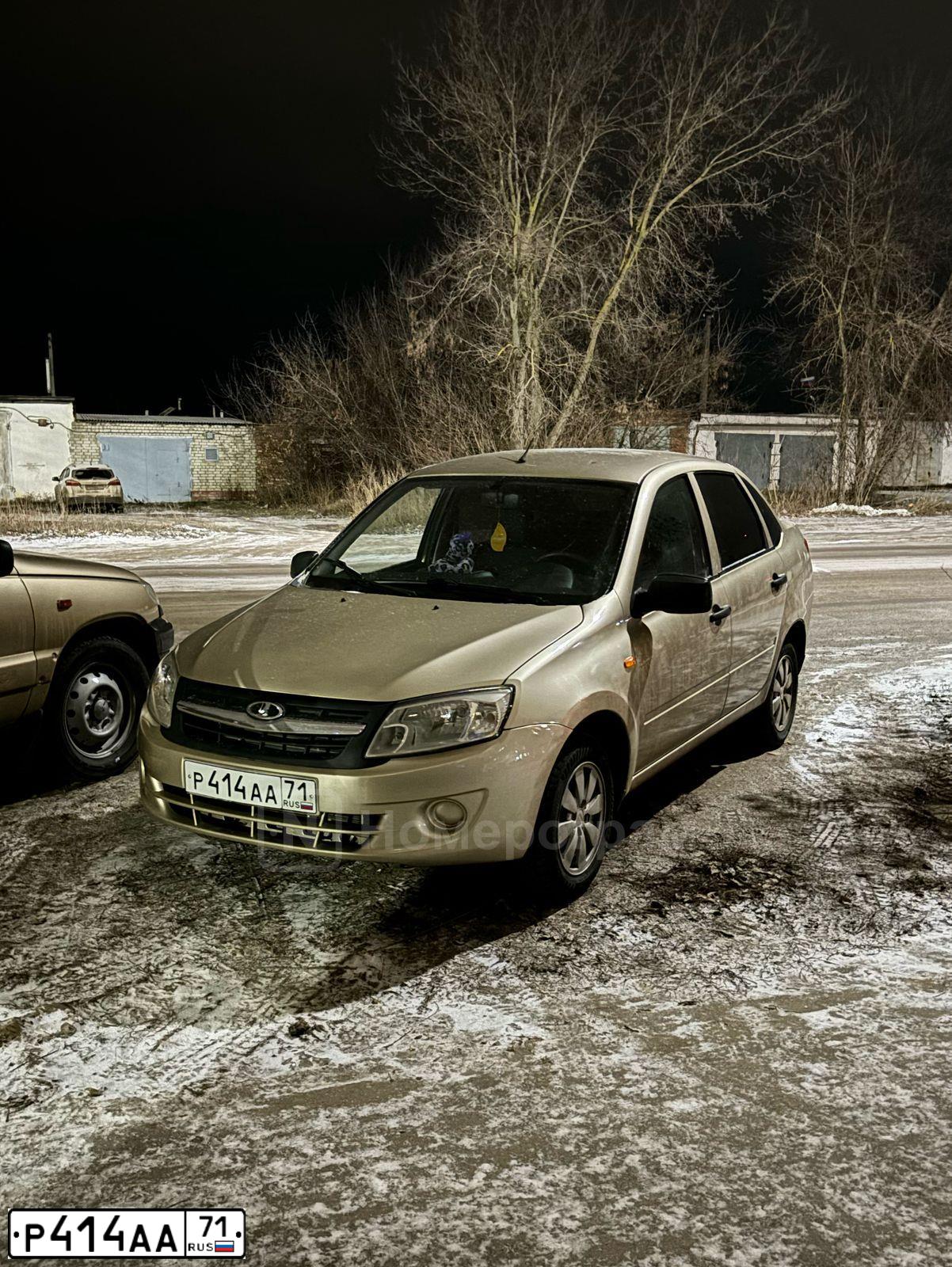 Фото автомобиля LADA 2190 GRANTA, 2013 — госномер Р414АА71. Цвет: СЕРЕБРИСТО-БЕЖЕВЫЙ
