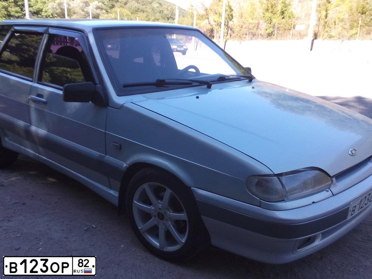 Фото автомобиля LADA 2114 SAMARA, 2005 — госномер В123ОР82. Цвет: СЕРЫЙ