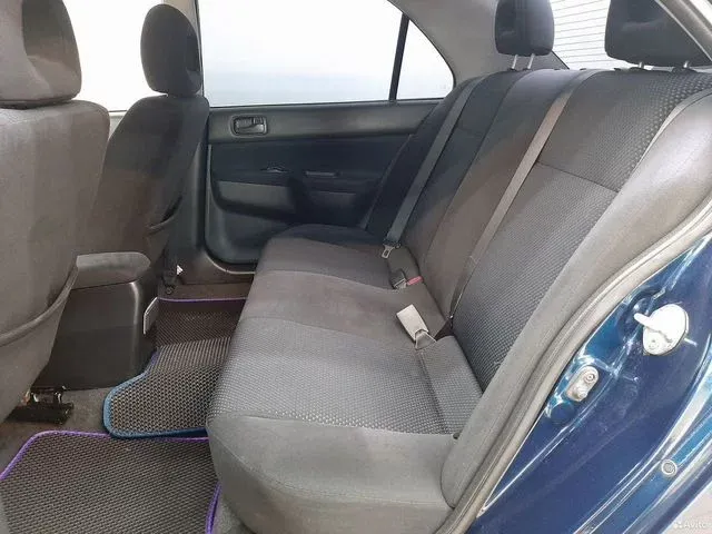 Фото автомобиля MITSUBISHI LANCER, 2006 — госномер Н586КМ977. Цвет: синий