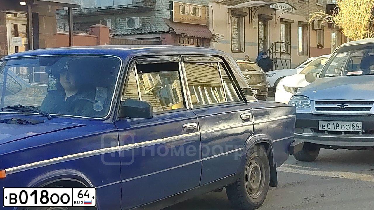 Фото автомобиля CHEVROLET NIVA, 2008 — госномер Т700СА64. Цвет: СВЕТЛО-СЕРЕБРИСТЫЙ МЕТАЛЛ