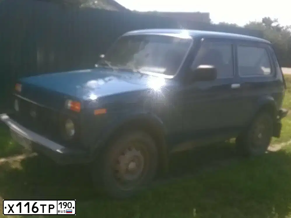 Фото автомобиля LADA 2121 NIVA, 2012 — госномер У412СО71. Цвет: сине-зеленый