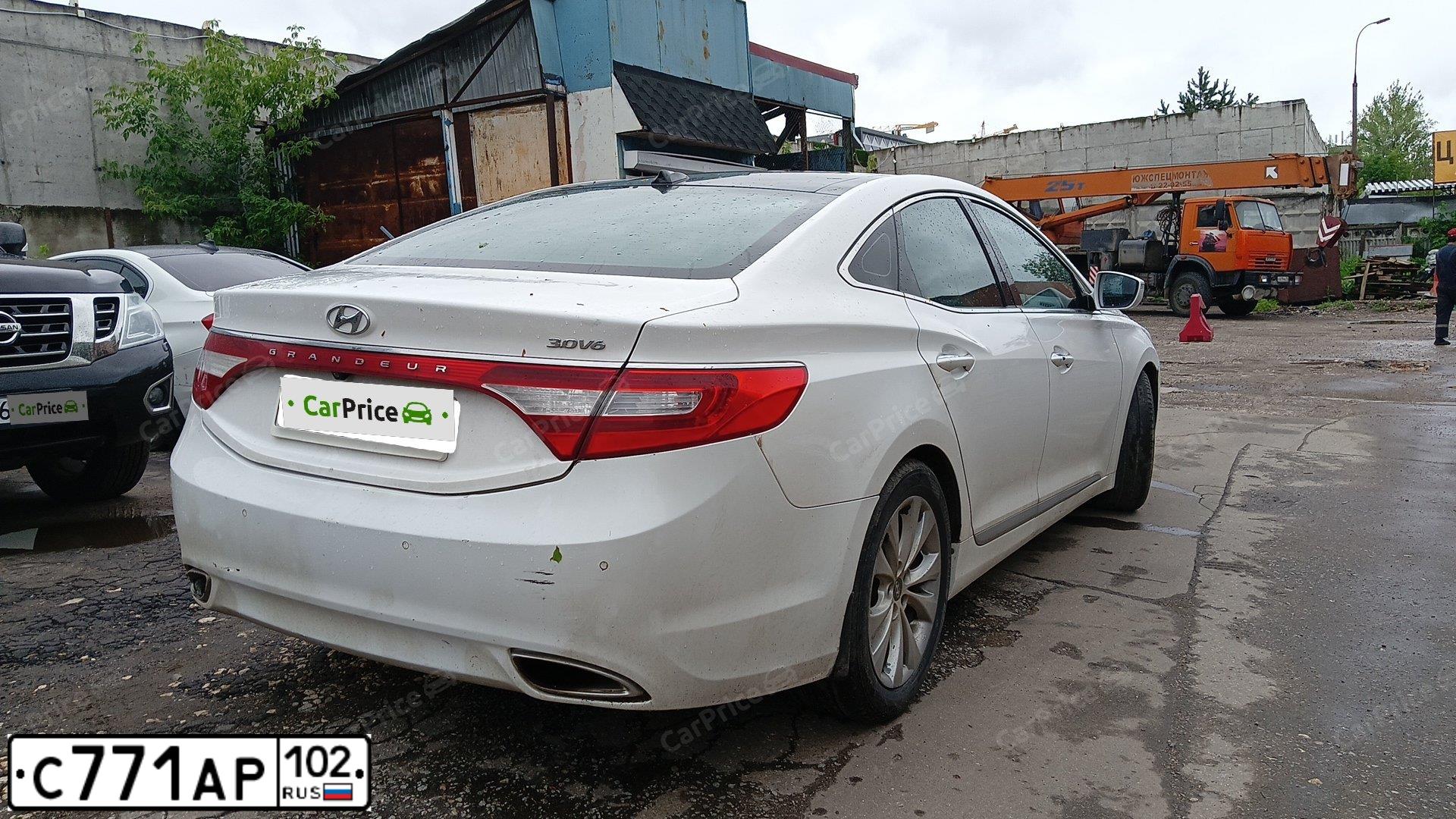 Фото автомобиля HYUNDAI GRANDEUR, 2013 — госномер Р272НС76