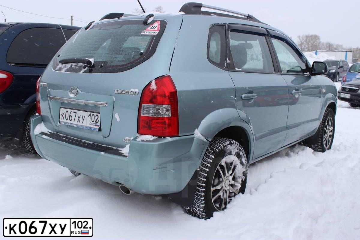 Фото автомобиля HYUNDAI TUCSON, 2008 — госномер Е784КХ702. Цвет: СВЕТЛО-ГОЛУБОЙ